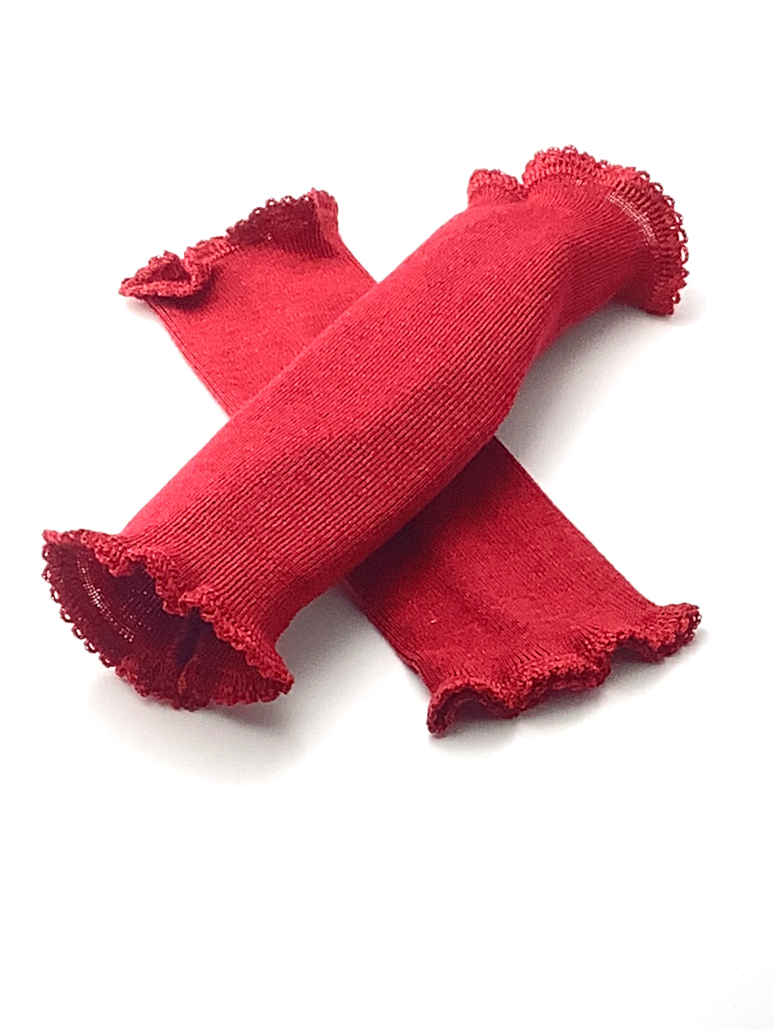 Rote Stulpen mit Spitzenrand Zwei rote Stulpen aus Strickstoff mit dekorativem Spitzenrand